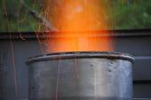 Wood fire to pre-heat the cupola and light the coke