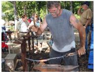 Working at the anvil during Fire in the Swamp 2009