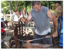 Working at the anvil during Fire in the Swamp 2009