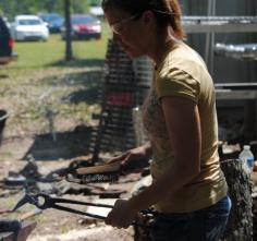 Deborah Davis forging a hummingbird