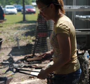 Deborah Davis forging a hummingbird