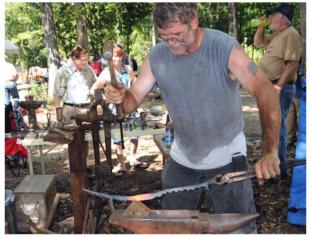 Working at the anvil during Fire in the Swamp 2009