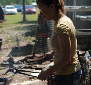 Deborah Davis forging a hummingbird