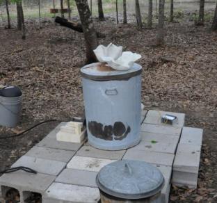 Raku kiln and pottery being pre-heated 