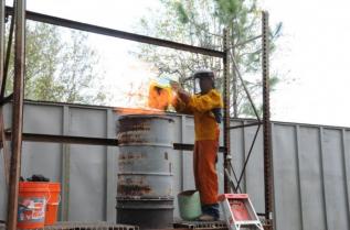 John Perilloux feeds the cupola