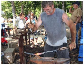 Working at the anvil during Fire in the Swamp 2009