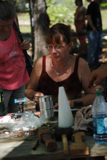 Sue Lincoln making a pewter mold for casting