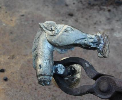 Freshly cast bronze horse-head cane handle