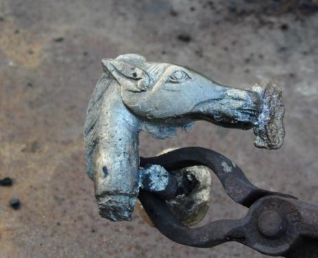 Freshly cast bronze horse-head cane handle