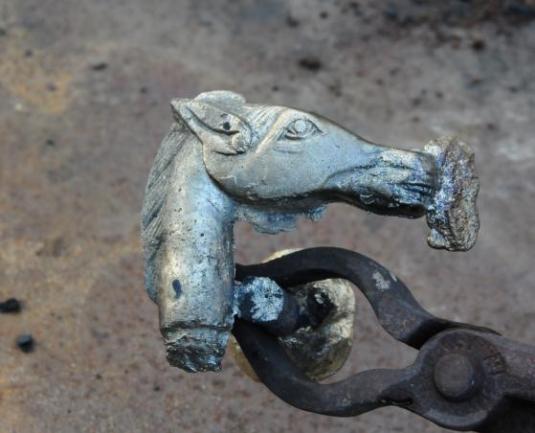 Freshly cast bronze horse-head cane handle