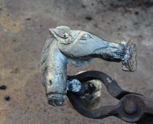 Freshly cast bronze horse-head cane handle