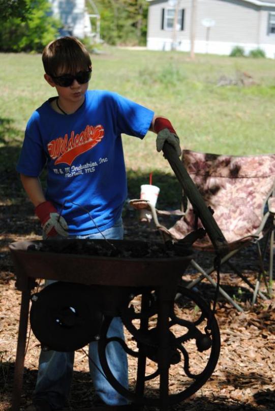 Hunter Averett at the forge
