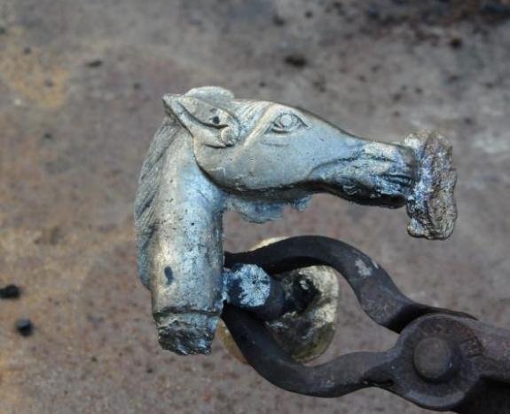 Freshly cast bronze horse-head cane handle