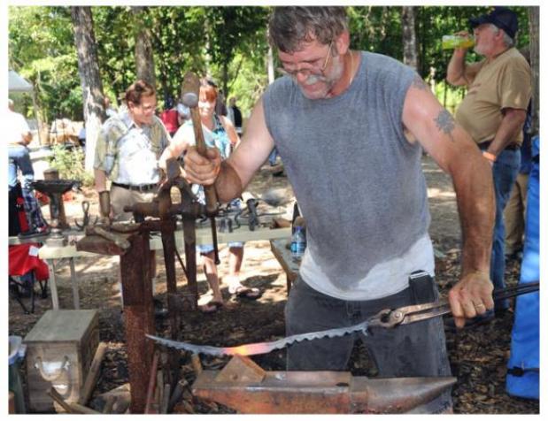 Working at the anvil during Fire in the Swamp 2009