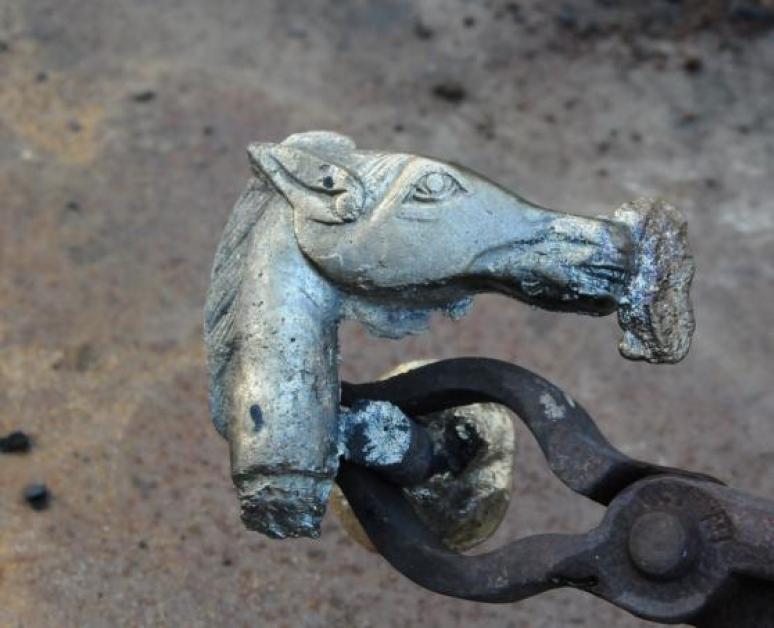Freshly cast bronze horse-head cane handle